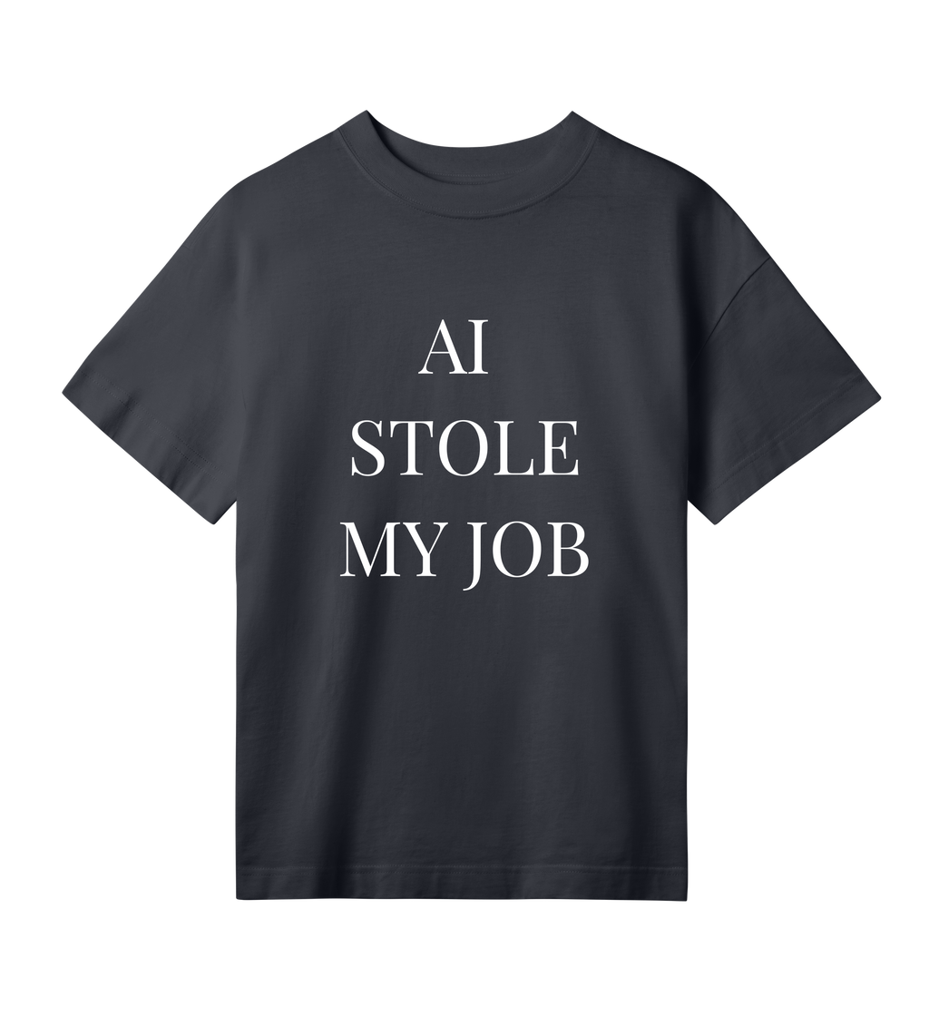Washed out black women’s oversized T-shirt with white “AI Stole My Job” print — heavy organic cotton, boxy cut, chunky crewneck rib.